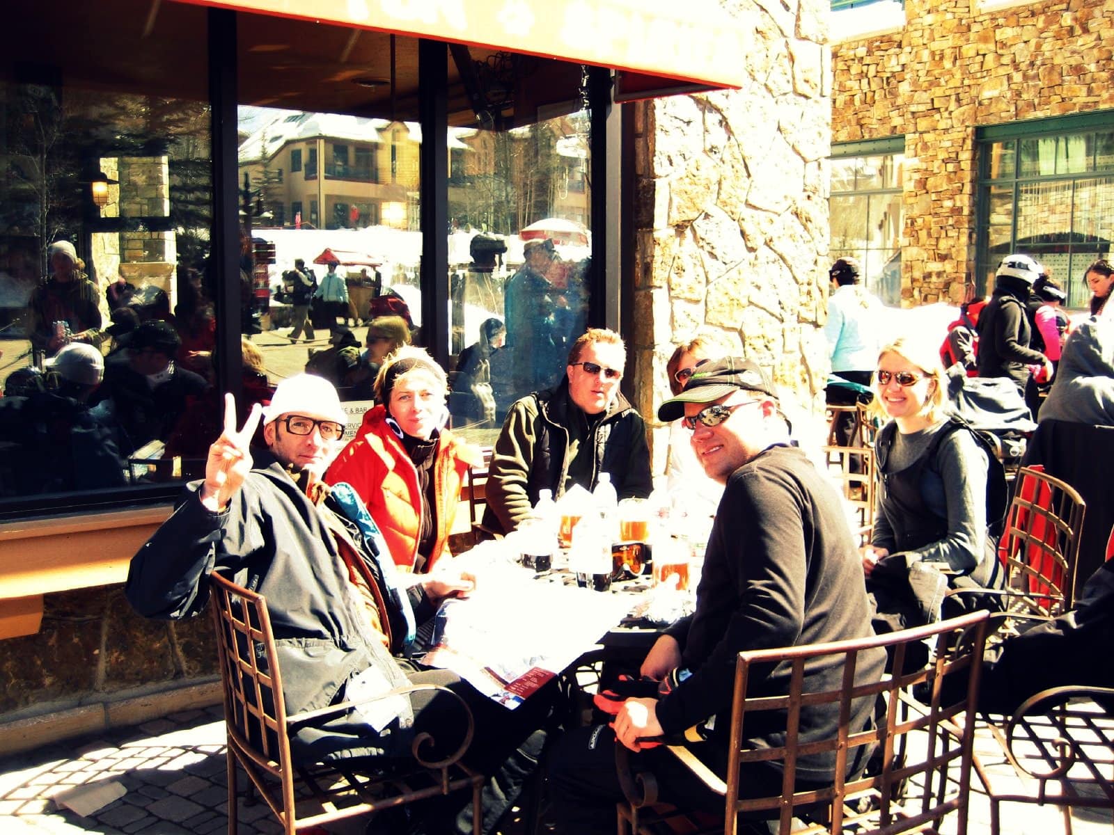 Group enjoys drinks and sandwiches at Apres Ski Telluride Mountain Village Colorado