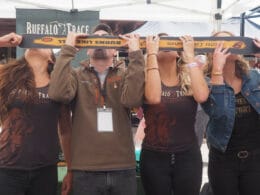 Image of people doing a skishot at the Breckenridge Hogfest: Bacon & Bourbon in Colorado