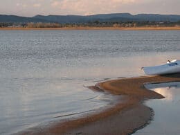 Image of a boat on the water at Douglas Reservoir in Fort Collins, Colorado