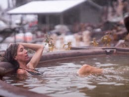 Image of a woman soaking in a mineral pool at the Durango Hot Springs Resort and Spa