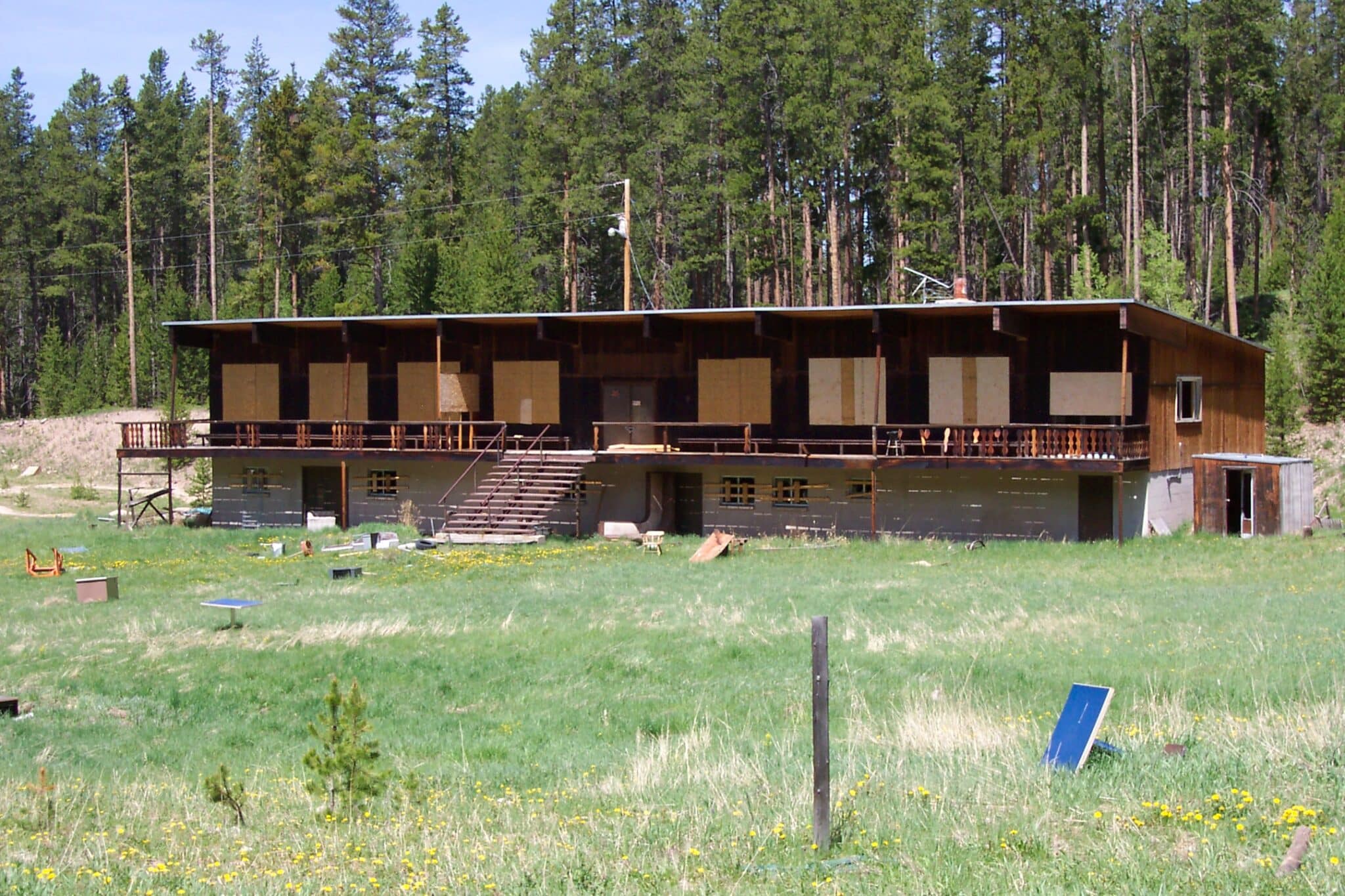 Abandoned one story wooden ski lodge, formerly Idlewild. 