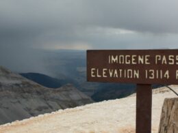 Image of the Imogene Pass elevation sign in Colorado