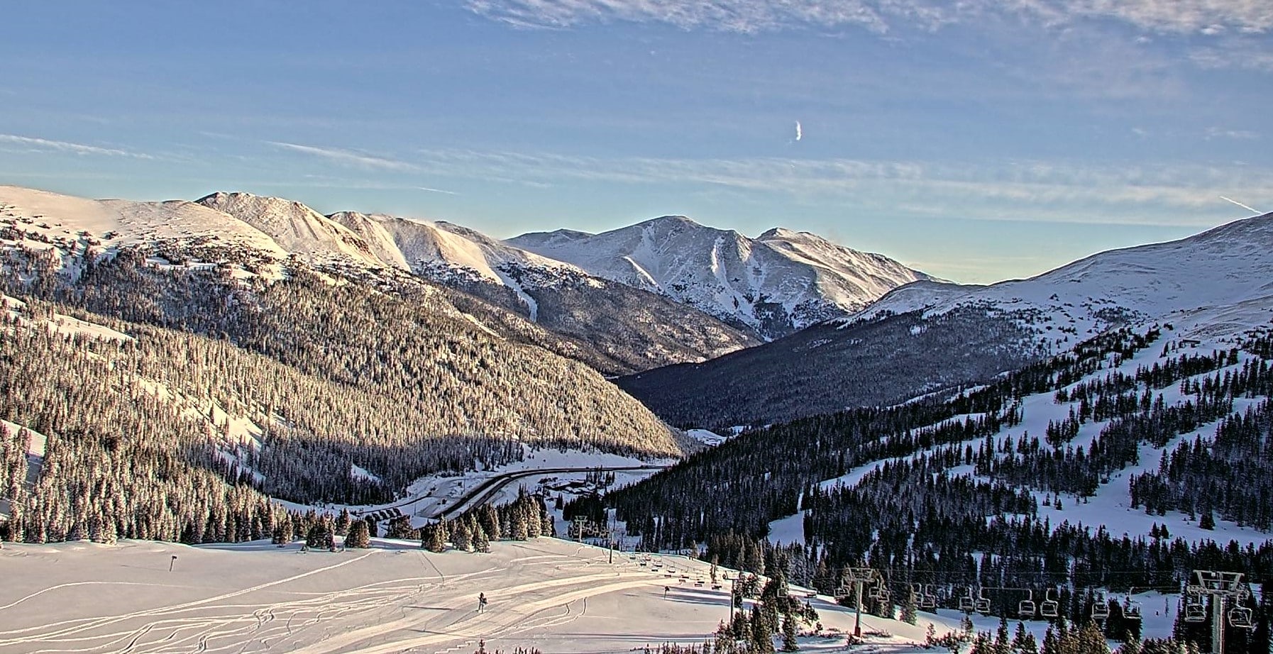 Morning light over the snow-covered mountains at Loveland Ski Area