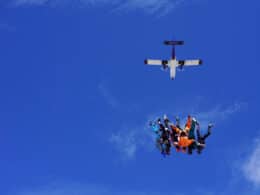 Image of skydivers falling to earth from a plane at Mile-Hi Skydiving Center in Longmont, CO