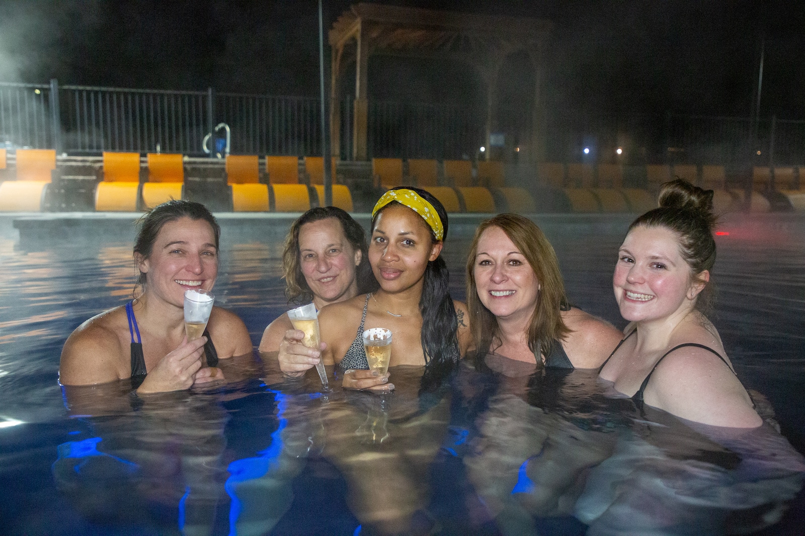 5 women soak in a pool at Mt Princeton Hot Springs in Nathrop CO