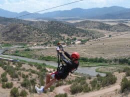 Man zipping in Canon City, Colorado with Royal Gorge Zip Line Tours