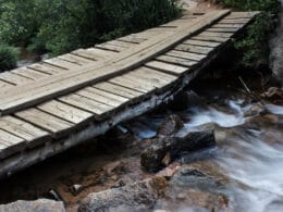 Image of a bridge crossing the water on Seven Bridges Trail in Colorado Springs, Colorado