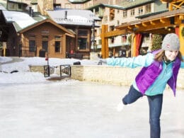 Image of a person skating t Winter Park Resort's ice rink in Colorado